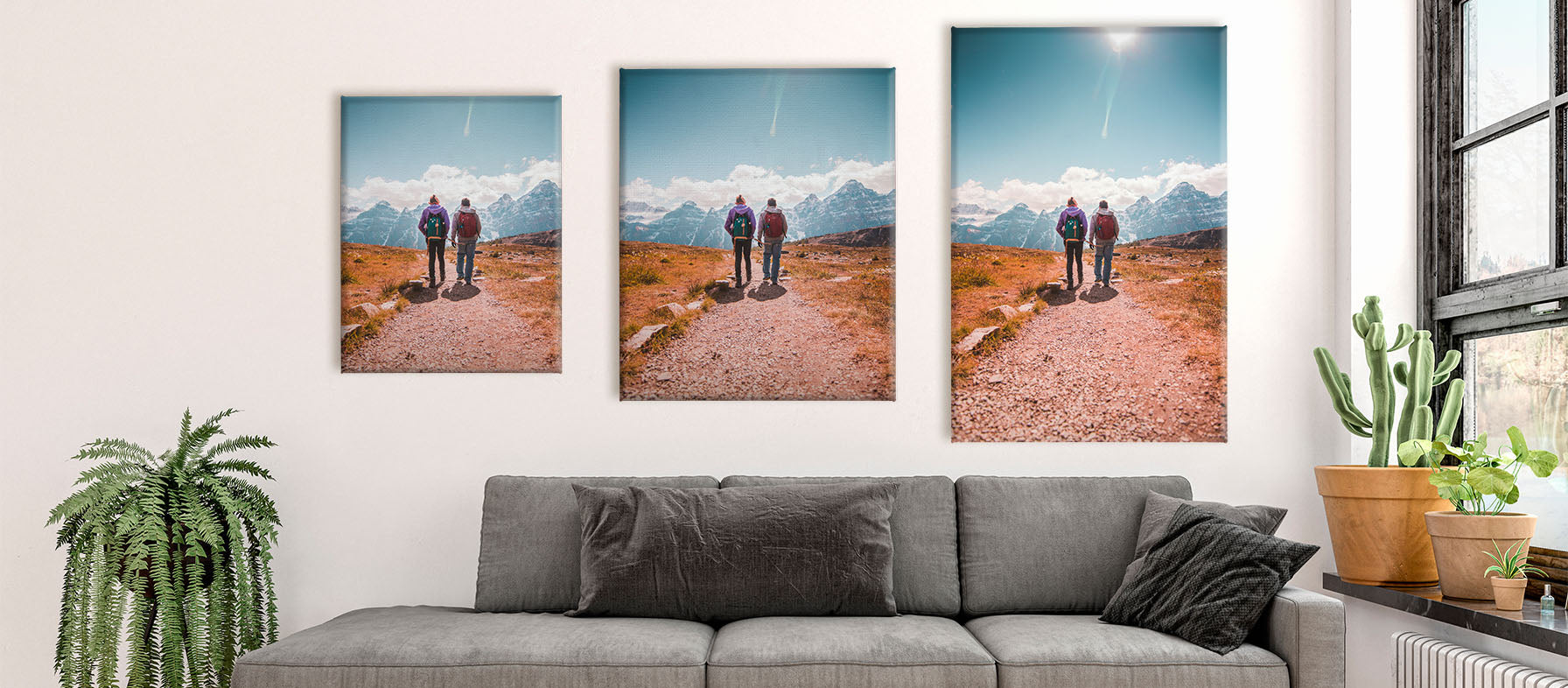 3 canvas photo prints hang on a wall. They are different size ratios to show how an image is cropped differently depending on its ratio.
